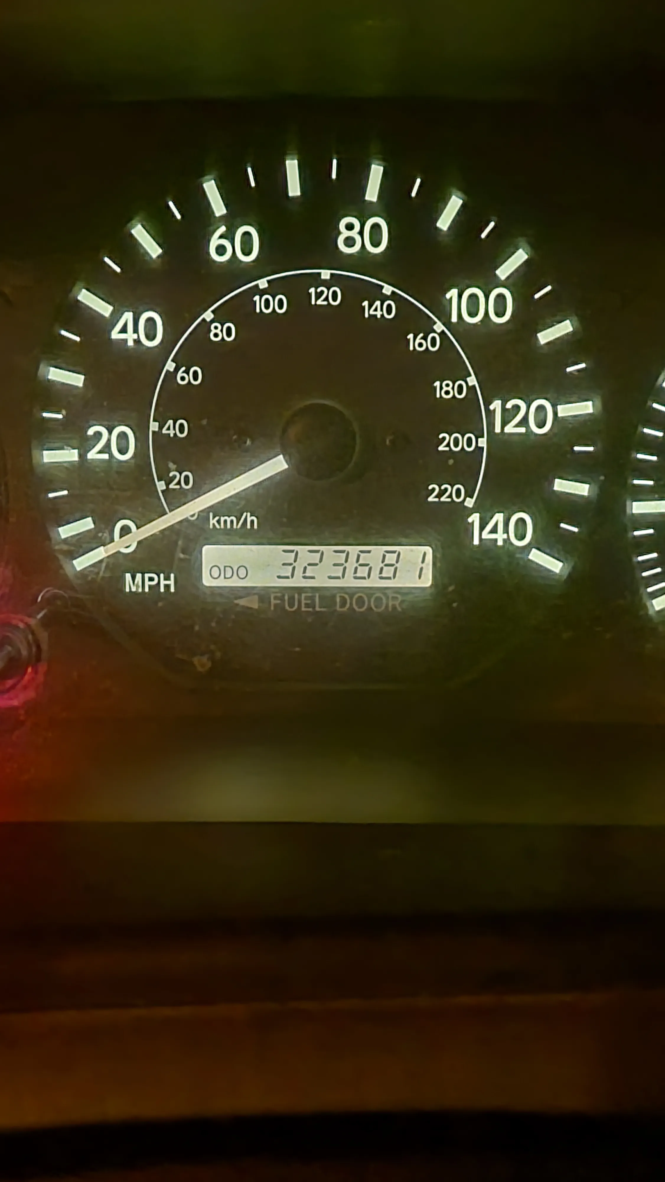 Toyota Camry Odometer showing 323,000 miles